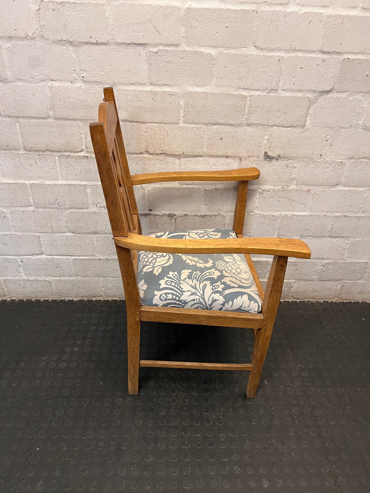 Vintage-Style Wooden Armchair with Patterned Seat – back view