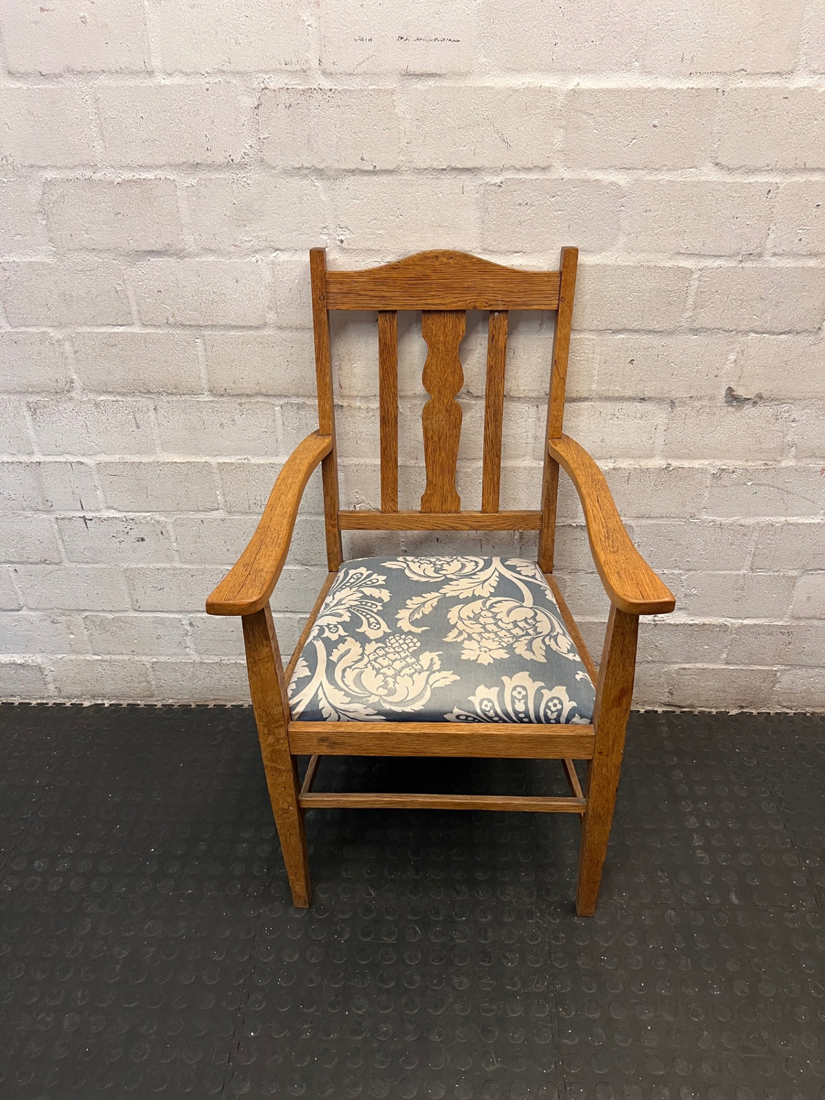 Vintage-Style Wooden Armchair with Patterned Seat – main front view