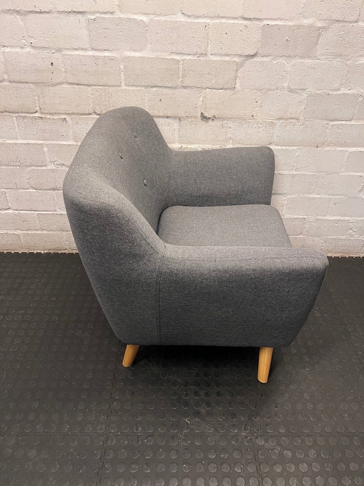 Dark Grey Fabric Armchair with Embossed Back and Wooden Legs – back view