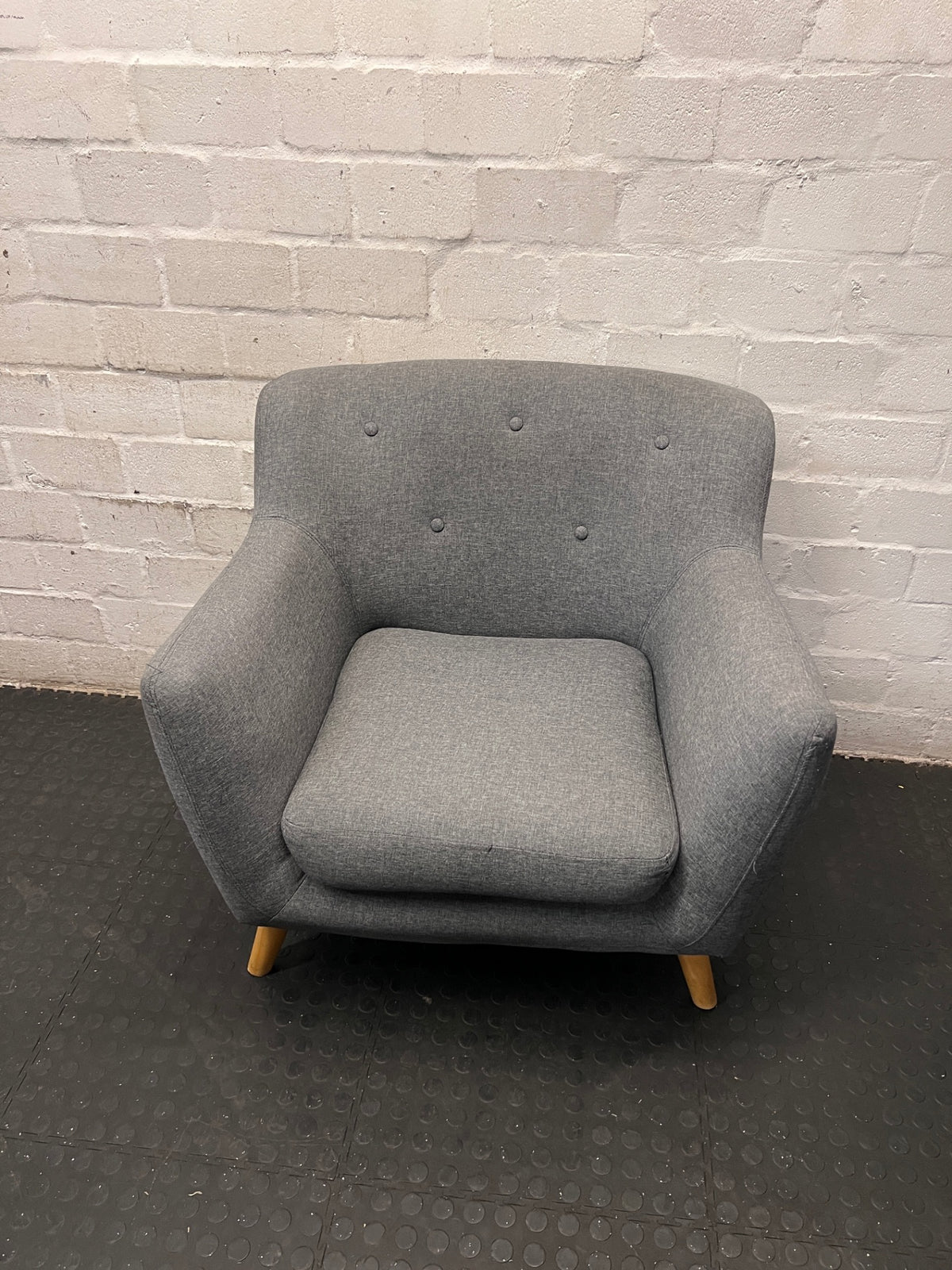 Dark Grey Fabric Armchair with Embossed Back and Wooden Legs – main front view