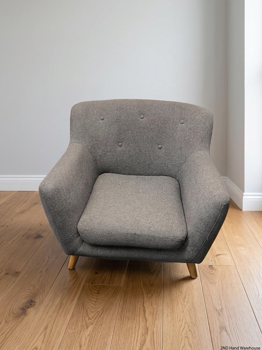 Dark Grey Fabric Armchair with Embossed Back and Wooden Legs – styled product image