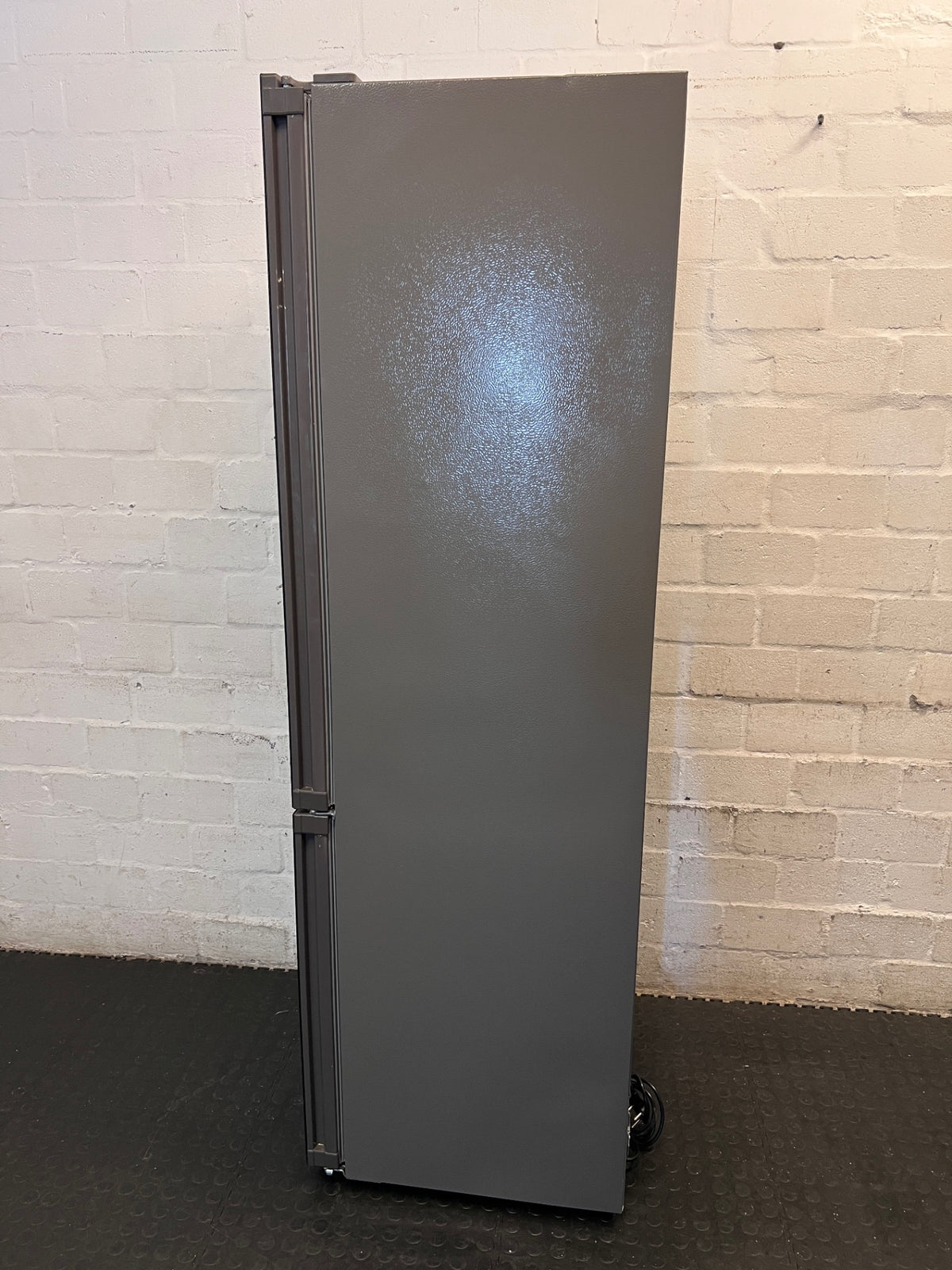 Hisense Black Glass Fridge with Water Dispenser – top view