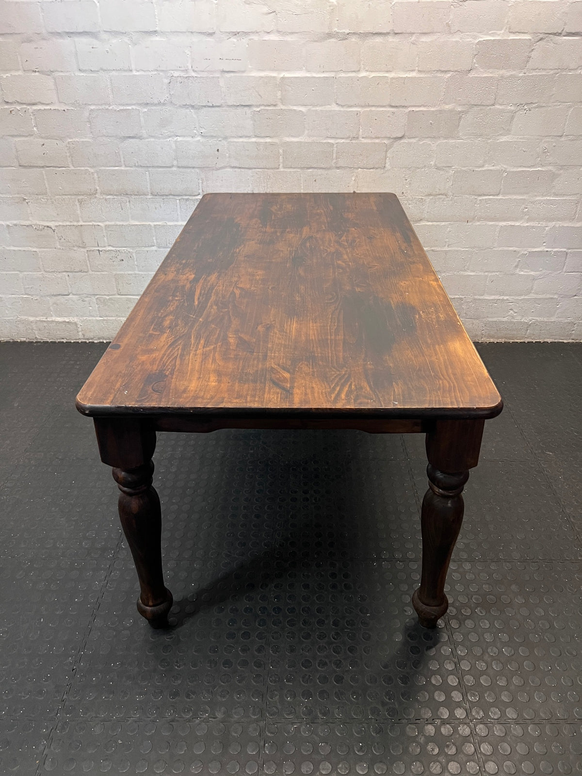 Dark Stained Pine Dining Table with Turned Legs – back view