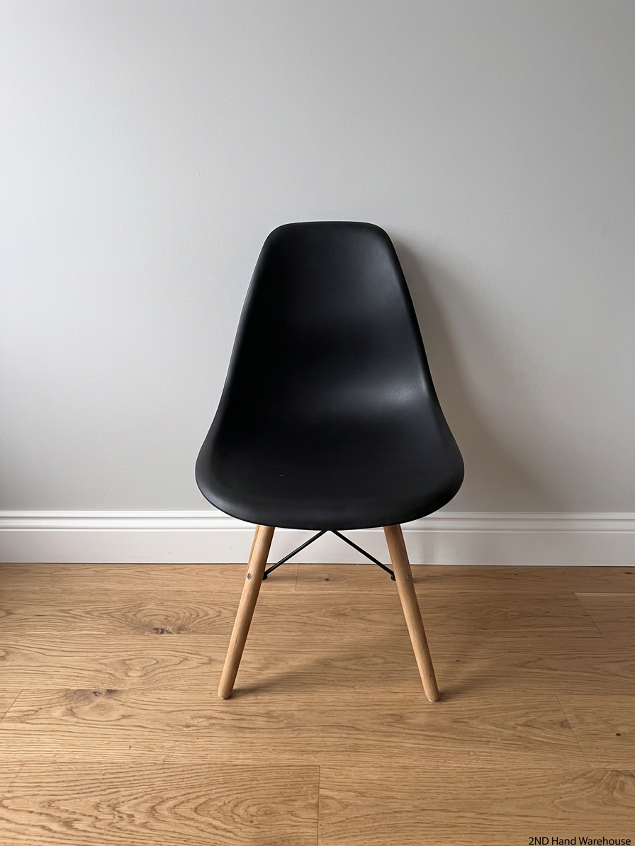 Black Moulded Plastic Dining Chair with Wooden Legs – styled product image
