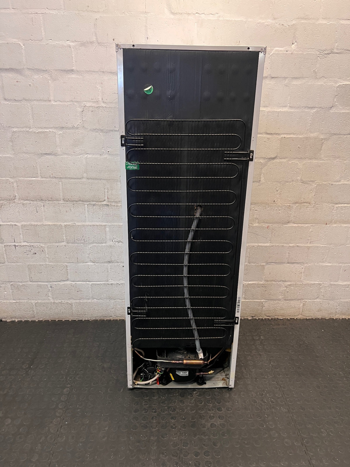 Defy White Freestanding Fridge Freezer — Non-Cooling with Structural and Shelf Damage – back view