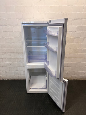 Defy White Freestanding Fridge Freezer — Non-Cooling with Structural and Shelf Damage – side view