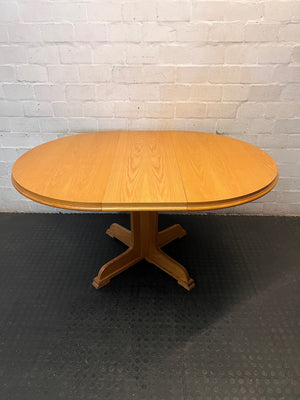 Round Wood-Finish Pedestal Dining Table – side view