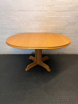 Round Wood-Finish Pedestal Dining Table – top view