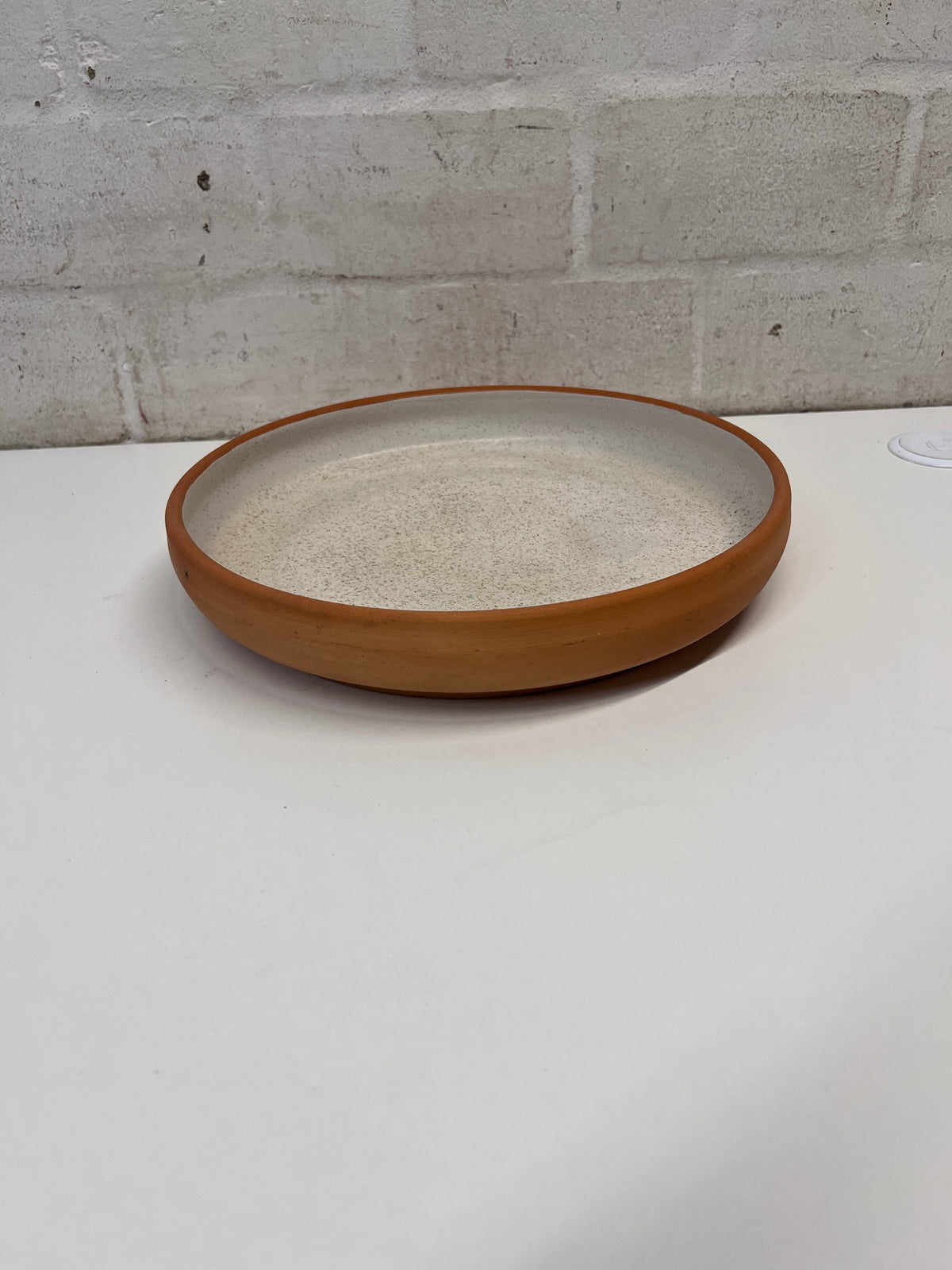 Speckled Ceramic Serving Platter with Terracotta Rim – back view