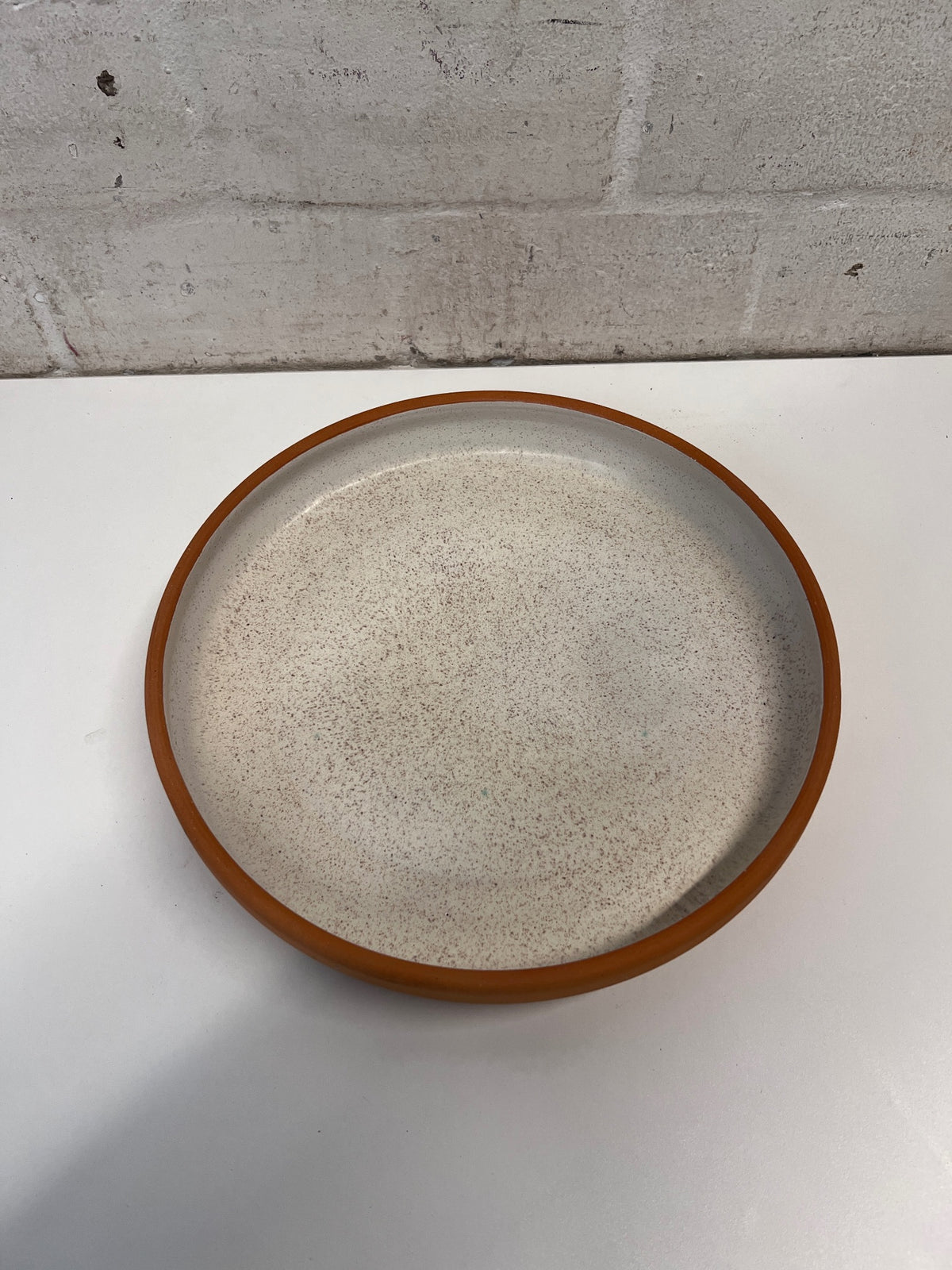 Speckled Ceramic Serving Platter with Terracotta Rim – side view