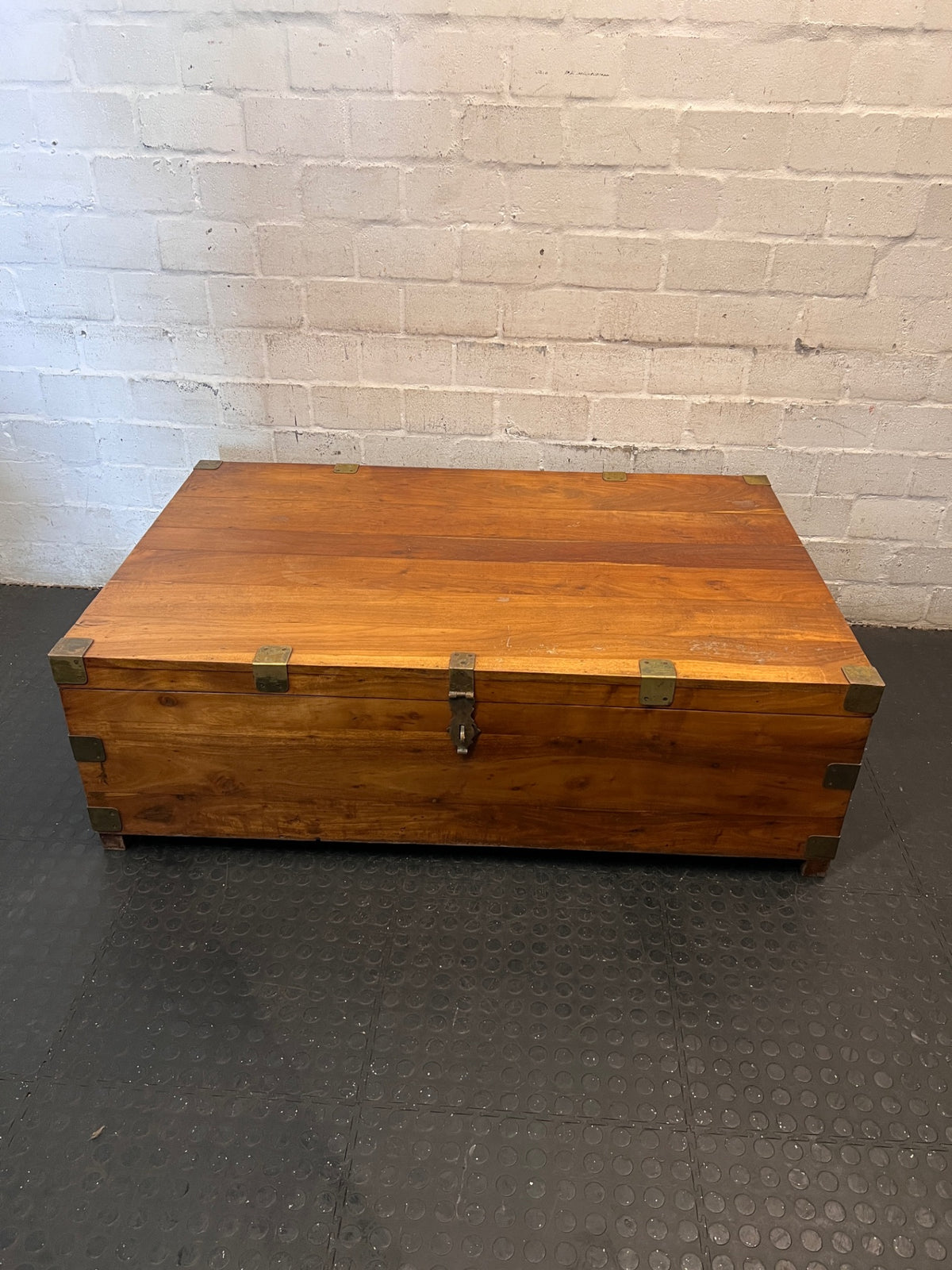 Solid Wood Storage Chest Coffee Table with Brass Detail — Broken Legs and Overall Damage – main front view
