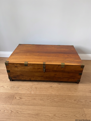 Solid Wood Storage Chest Coffee Table with Brass Detail — Broken Legs and Overall Damage – styled product image