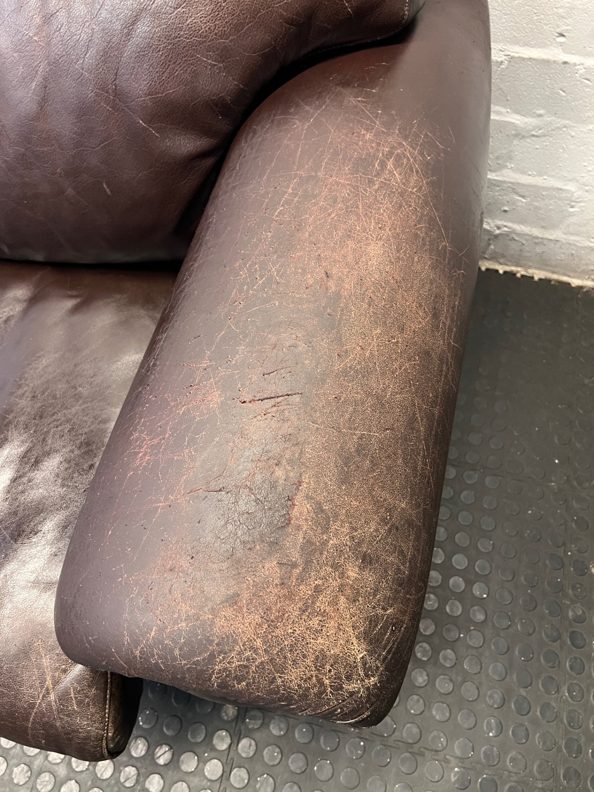 Dark Brown Leather 3 Seater Couch with Stud Detail — Scratches on Arms – condition detail
