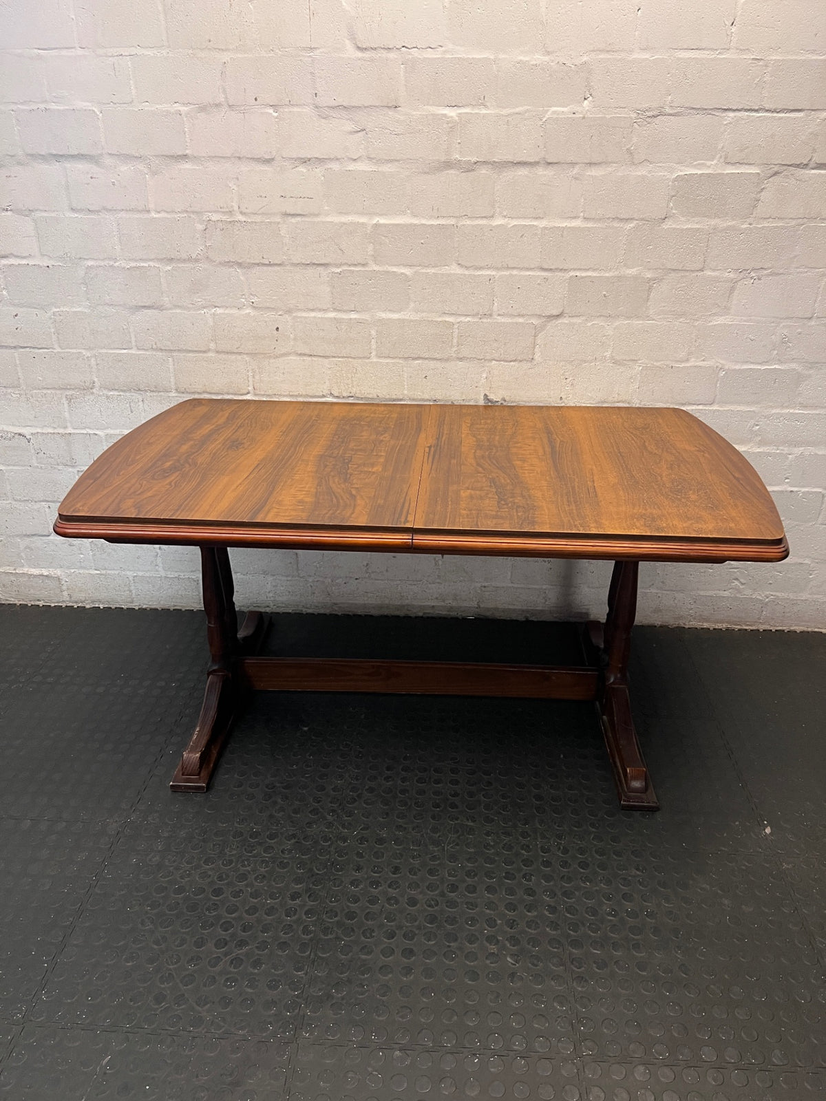 Dark Wood Trestle Dining Table – main front view
