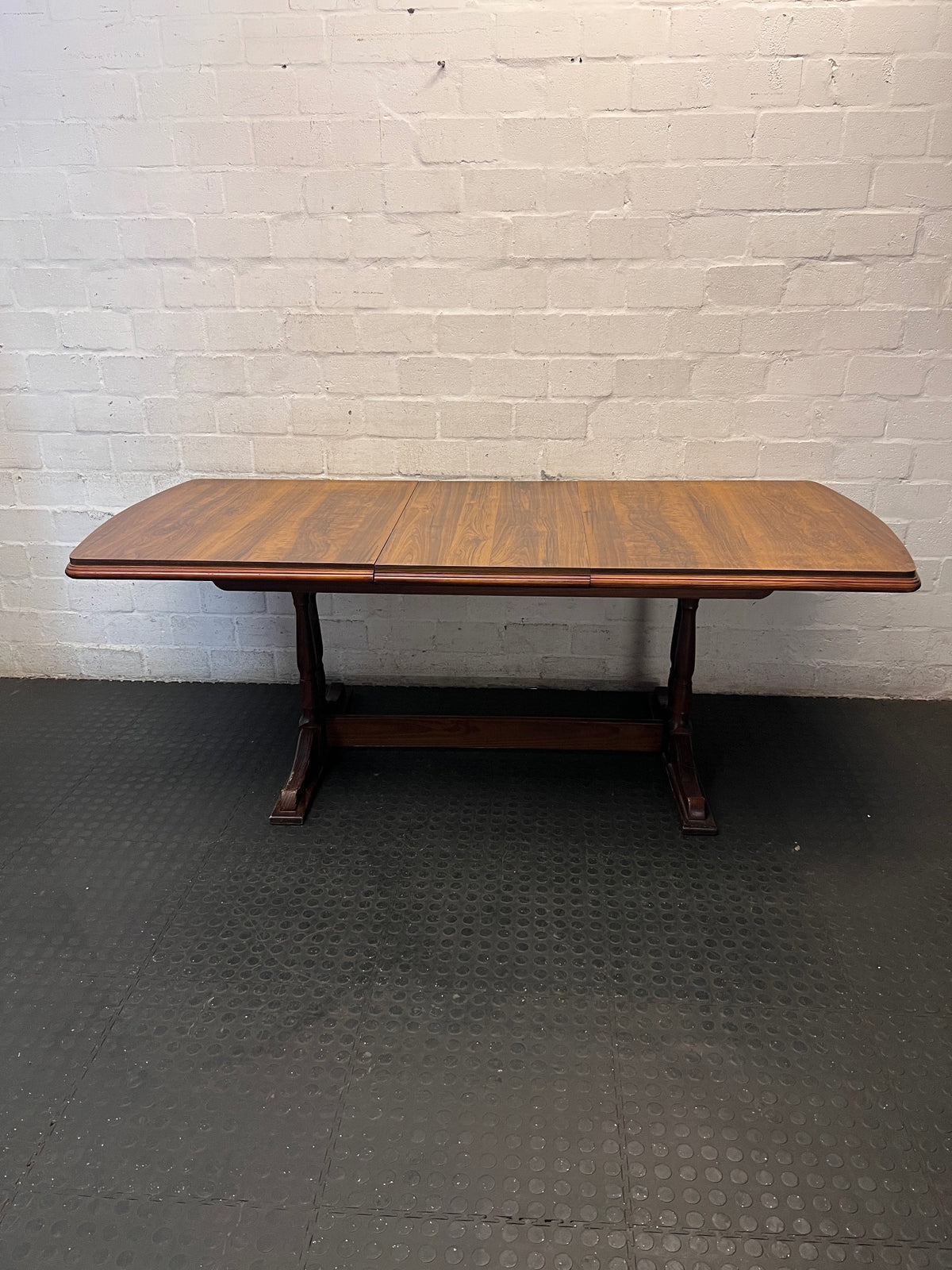 Dark Wood Trestle Dining Table – side view