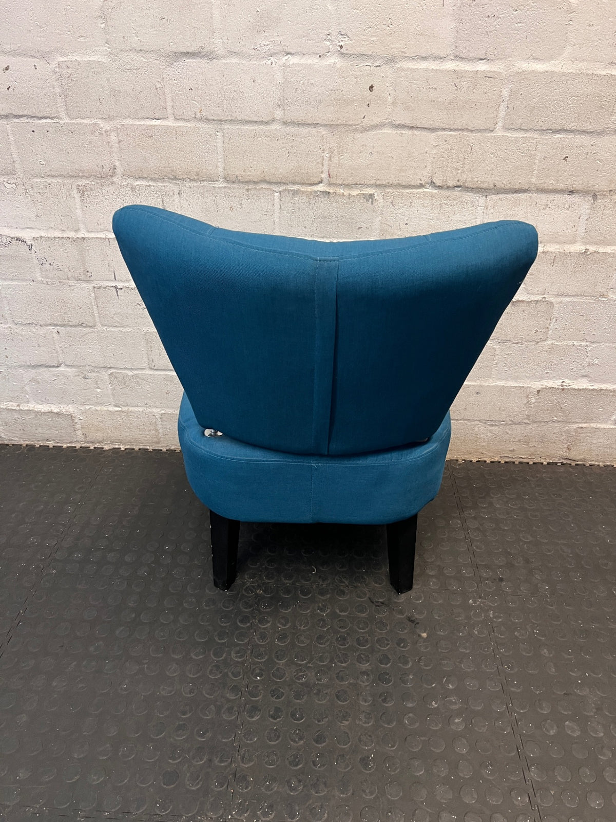 Teal Upholstered Armless Accent Chair – condition detail