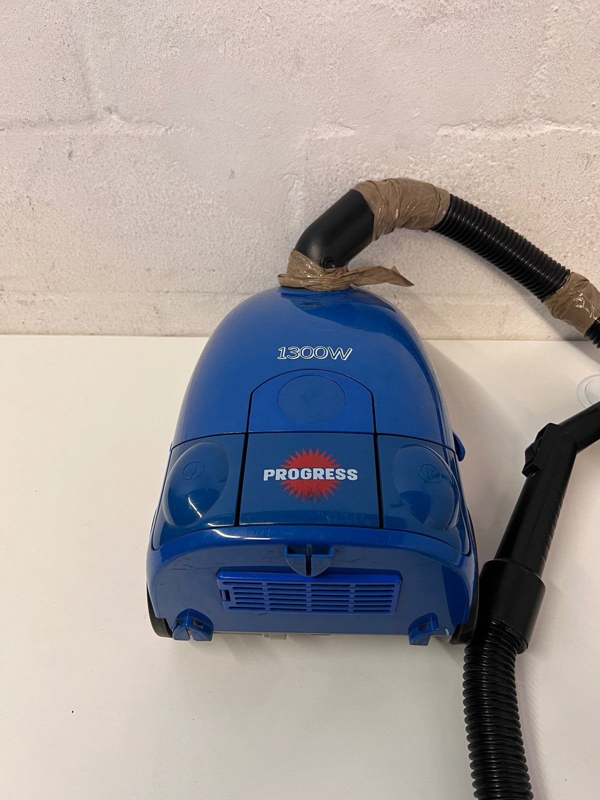 Blue Canister Vacuum Cleaner with Attachments – condition detail