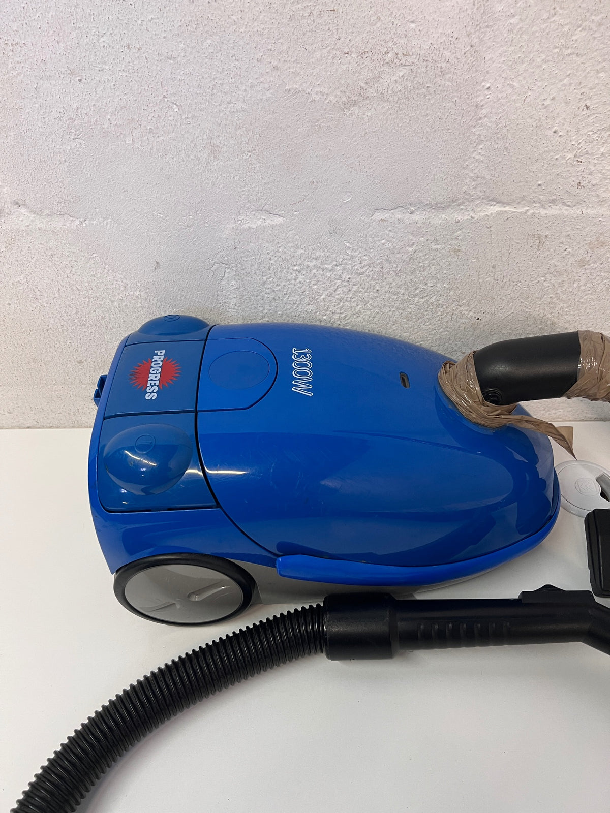 Blue Canister Vacuum Cleaner with Attachments – side view