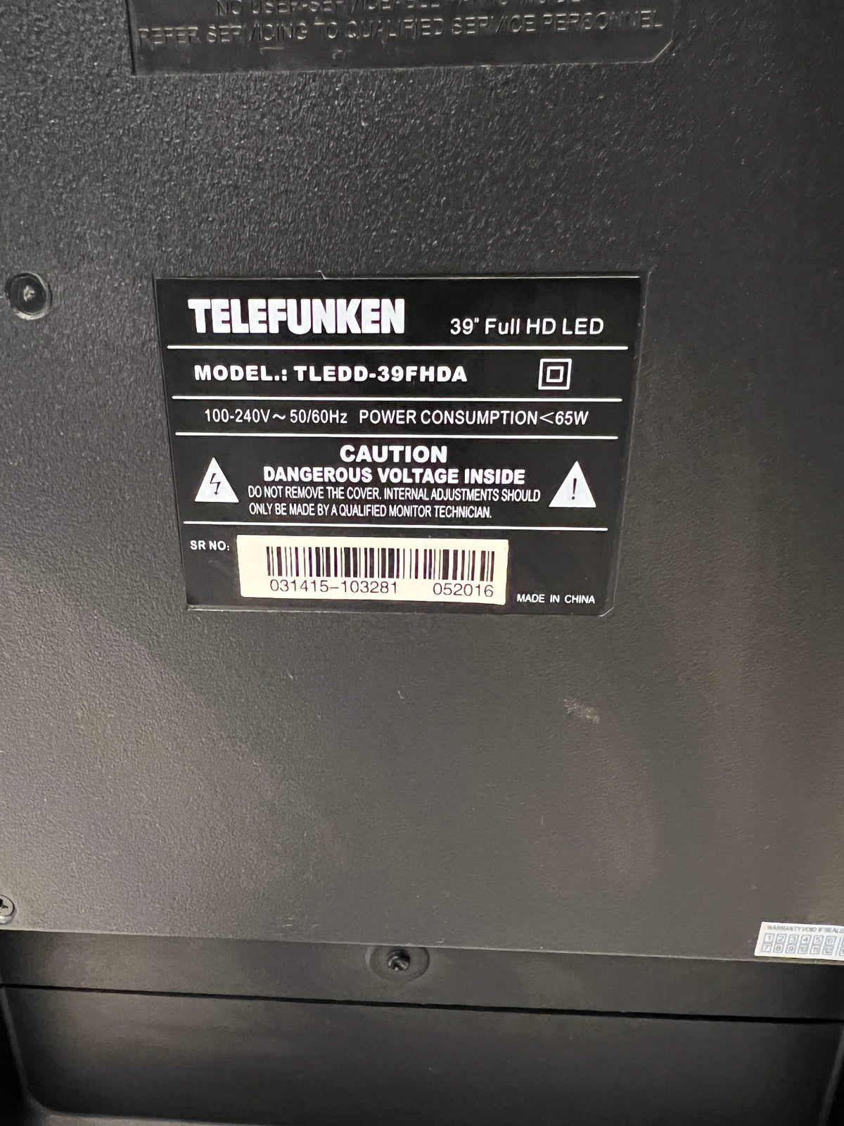 Telefunken Black LCD TV with Remote Control – back view