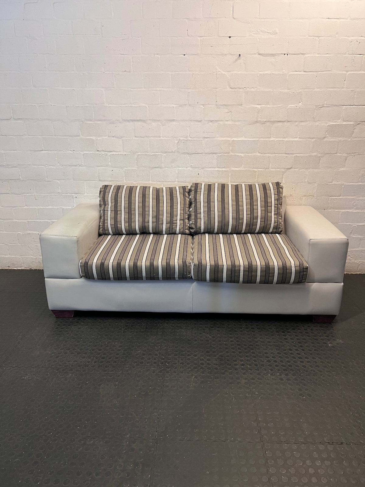 White Two Seater Couch with Striped Fabric Cushions – main front view