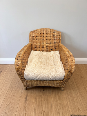 Wicker Armchair with Patterned Cushion – styled product image