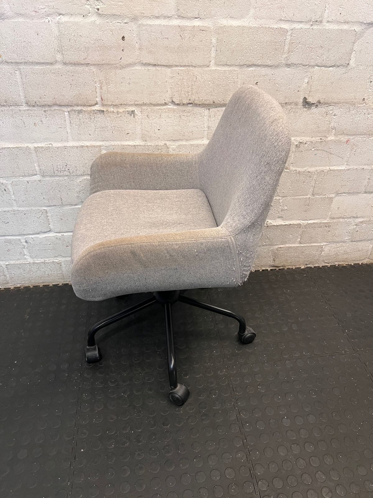 Grey Fabric Office Chair with Black Swivel Base – back view