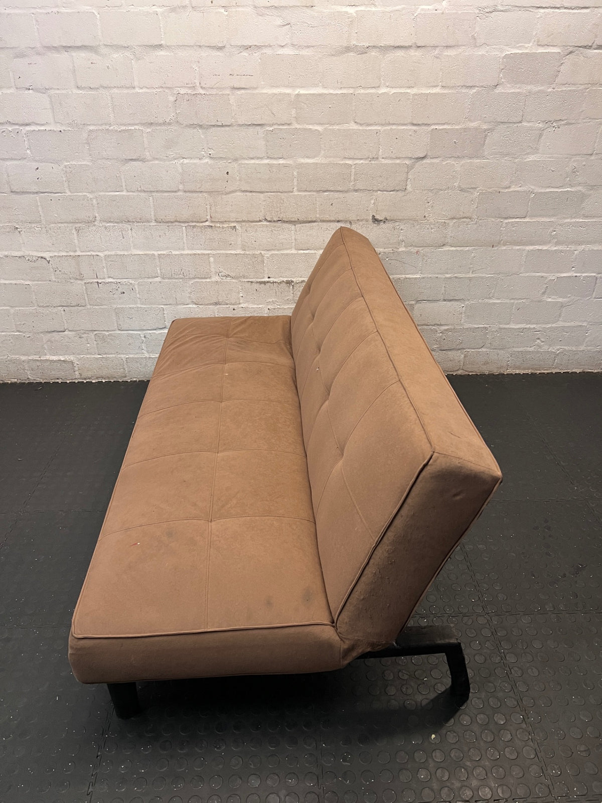 Brown Fabric Armless Sleeper Couch – side view