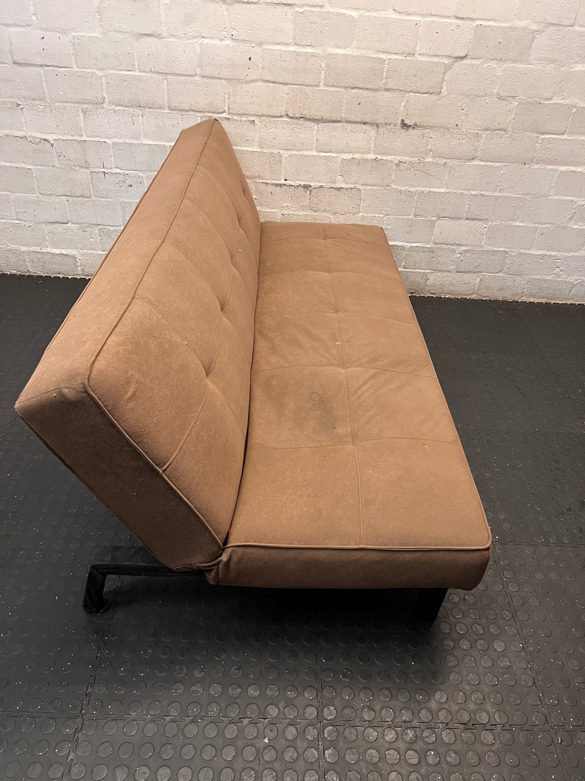 Brown Fabric Armless Sleeper Couch – top view