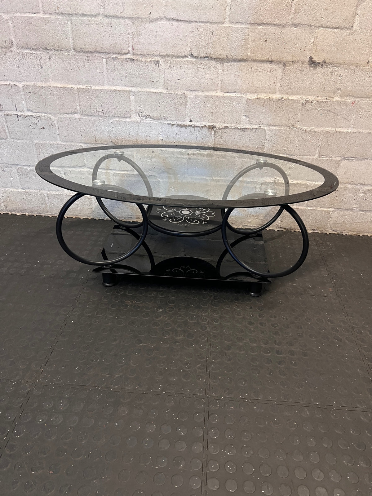 Oval Glass and Black Metal Coffee Table with Filigree Detail – main front view
