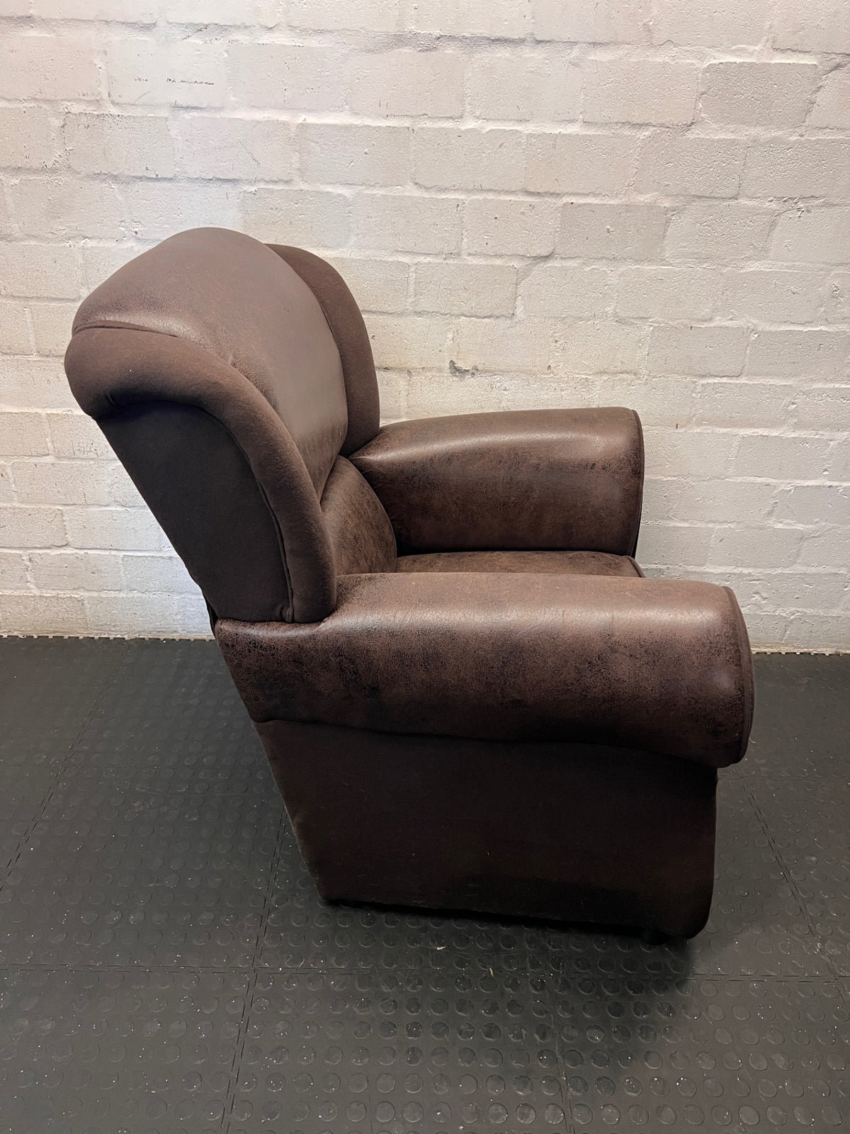 Brown Textured Faux-Leather One Seater Couch – back view