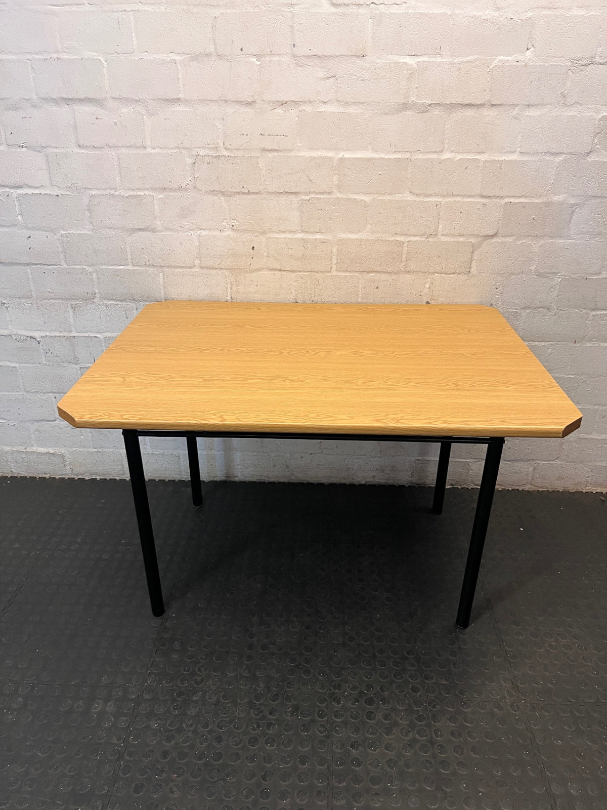 Oak Tone Dining Table with Black Metal Legs – condition detail