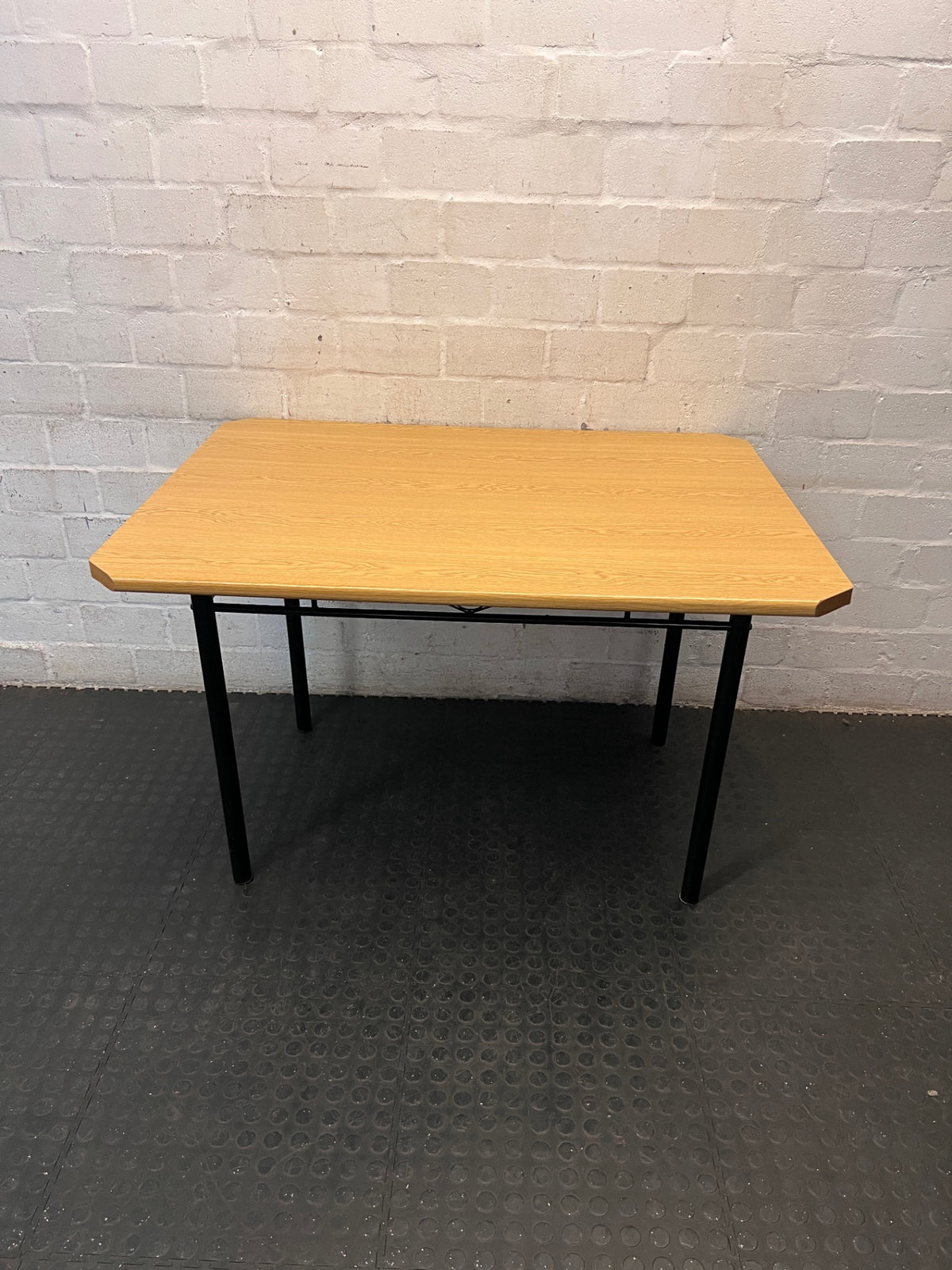 Oak Tone Dining Table with Black Metal Legs – main front view