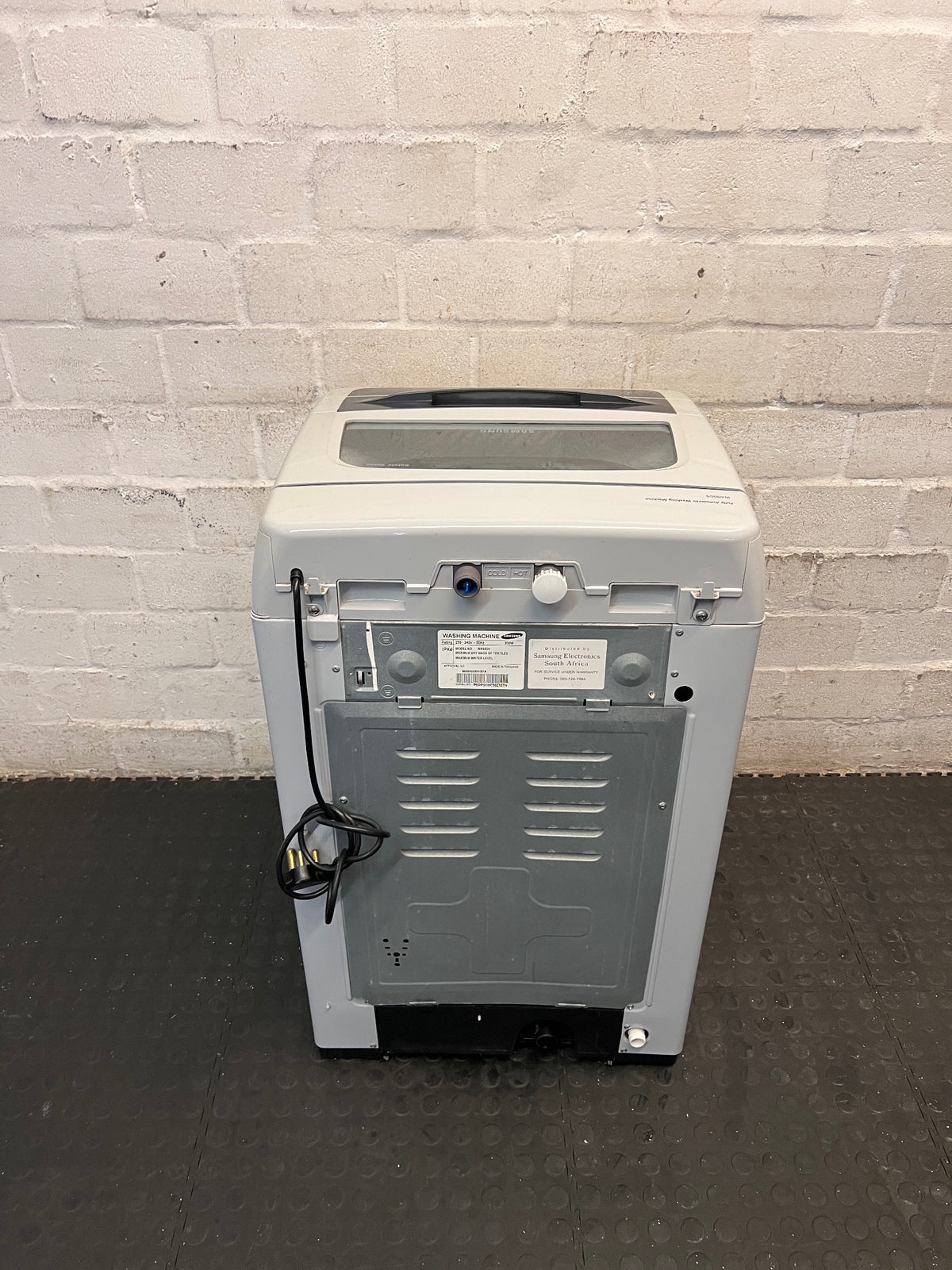 White Top-Loader Washing Machine with Digital Display – back view