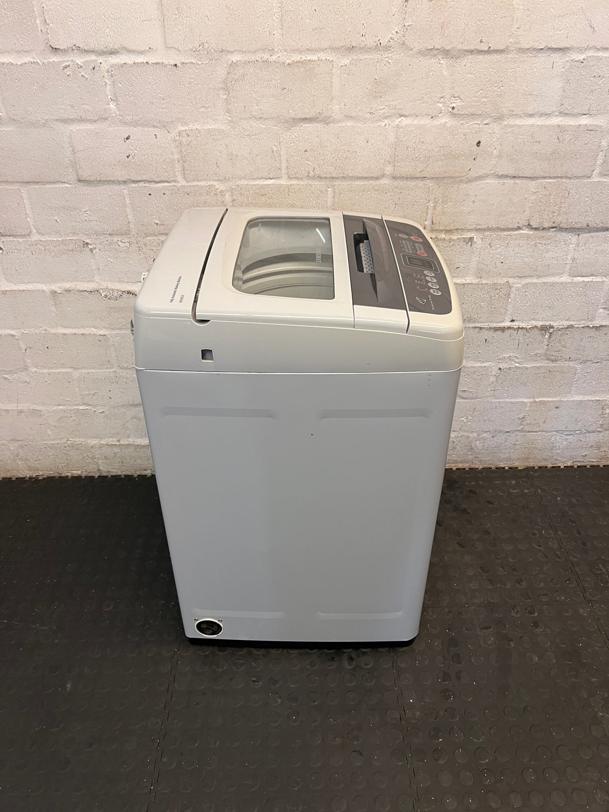 White Top-Loader Washing Machine with Digital Display – top view