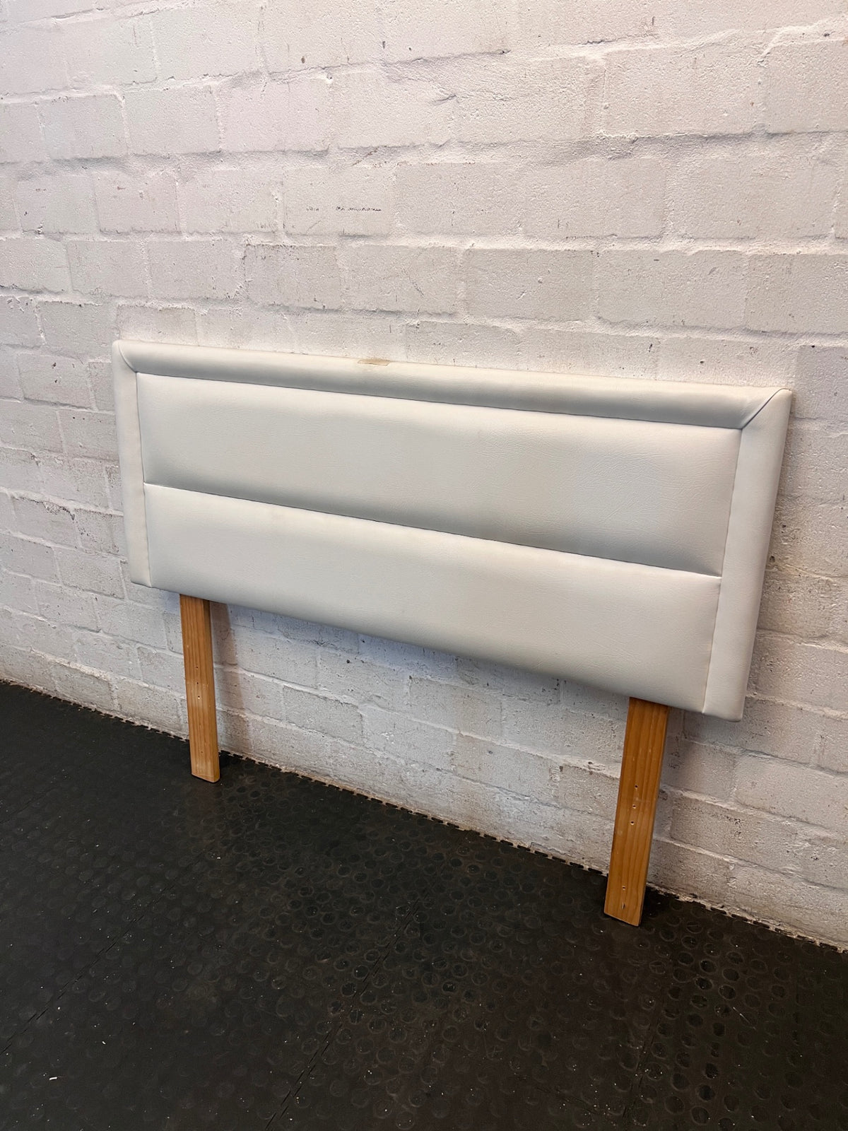 Upholstered Faux Leather Double Headboard with Wooden Legs – condition detail