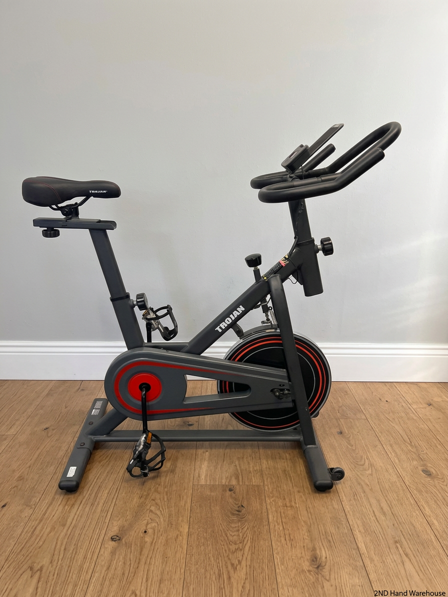 Trojan Spin 120 Exercise Bike in Dark Grey — Good Working Order; Missing Sticker on Wheel