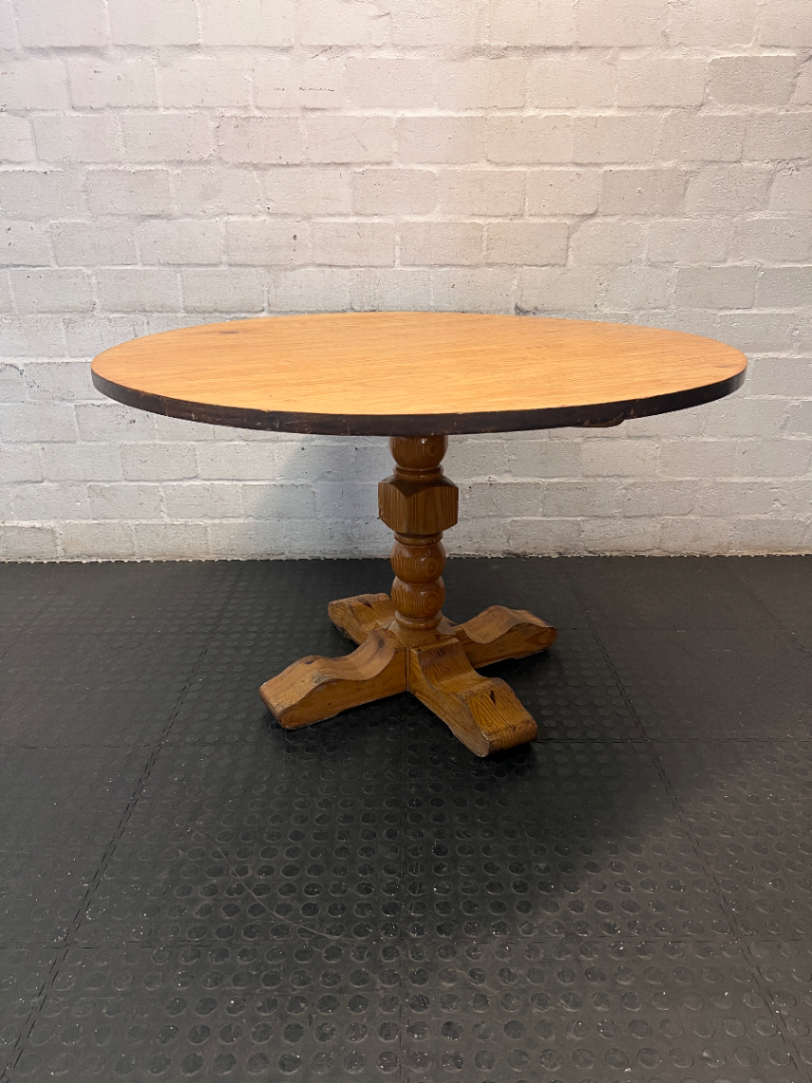 Round Wooden Pedestal Dining Table
