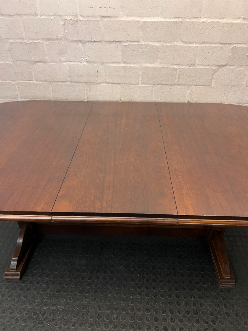 Oval Dark Wood Trestle Dining Table