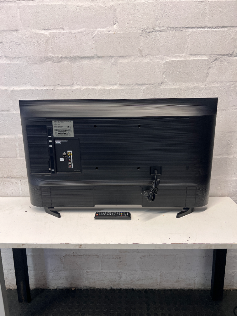Sleek Black Flat Screen Television — Working Well in Fair Used Condition