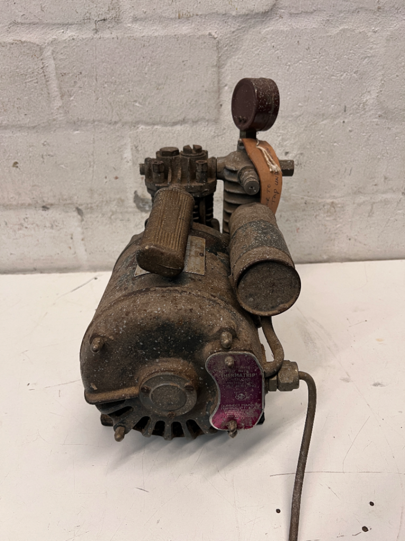 Vintage Portable Air Compressor with Pressure Gauge — Significant Wear and Surface Corrosion