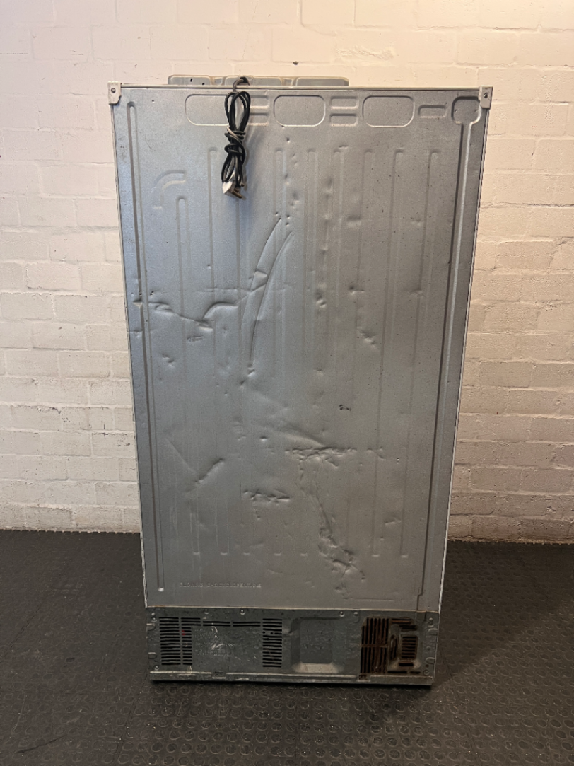 White LG Side-by-Side Fridge Freezer — Good Working Order with Dents on Doors