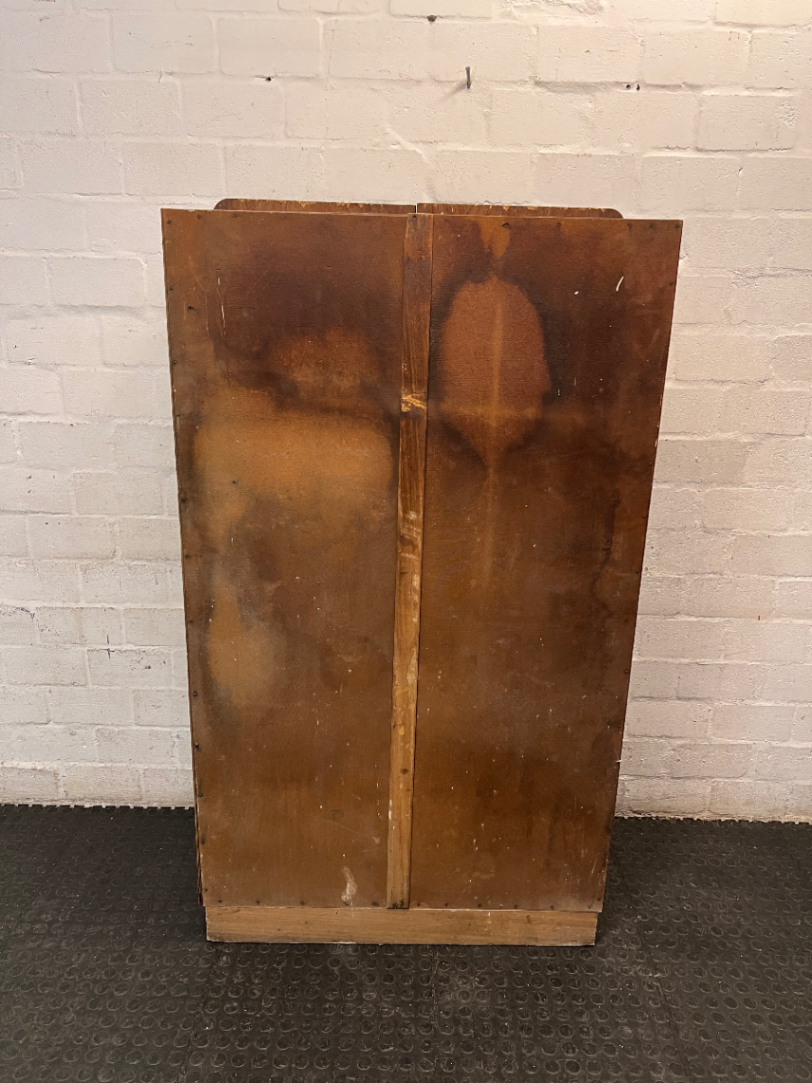 Vintage Dark Wood Two-Door Cupboard — Vintage Condition with Surface Wear and Stickers