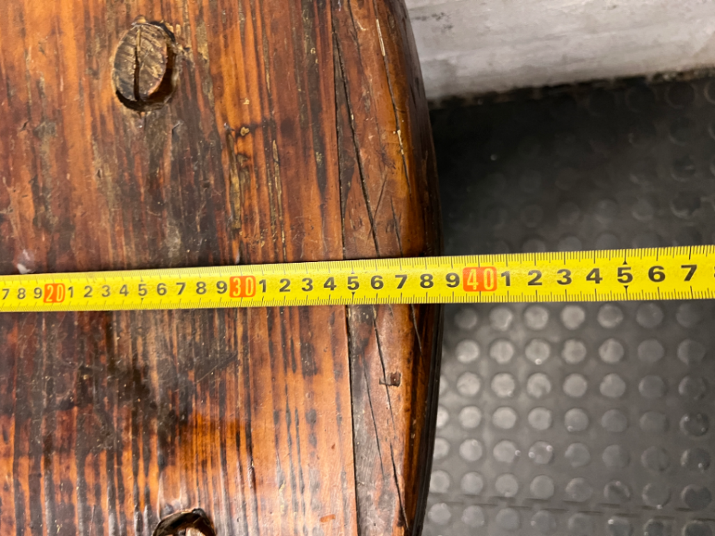 Rustic Hand-Carved Three-Legged Wooden Stool