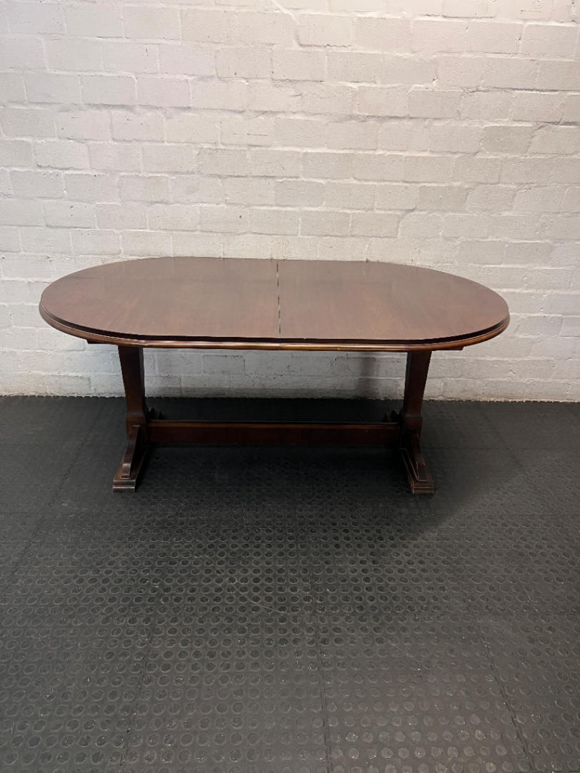 Oval Dark Wood Trestle Dining Table