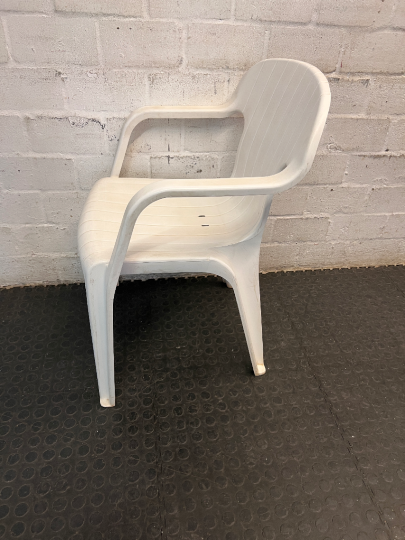 White Moulded Plastic Outdoor Armchair — Surface Wear and Cracks
