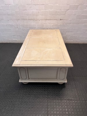 Cream Panelled Wood Coffee Table with Bun Feet — Visible Wear and Paint Chipping