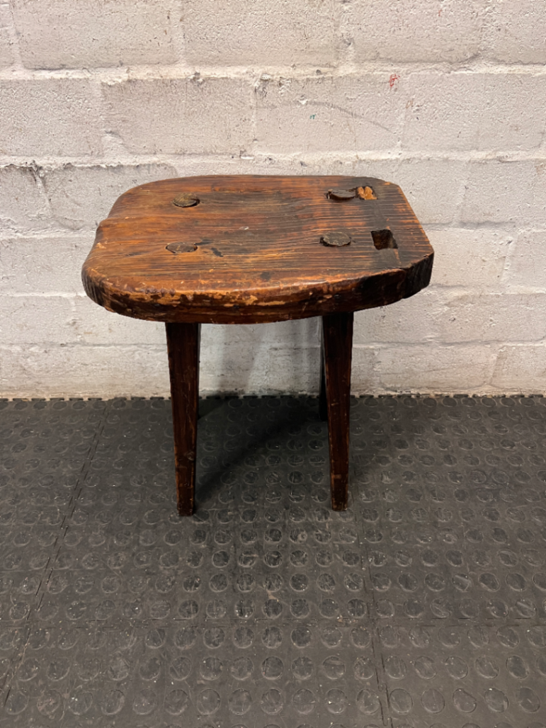 Rustic Hand-Carved Three-Legged Wooden Stool