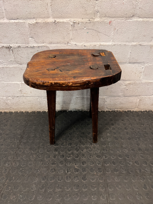 Rustic Hand-Carved Three-Legged Wooden Stool