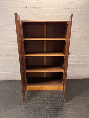 Vintage Dark Wood Two-Door Cupboard — Vintage Condition with Surface Wear and Stickers