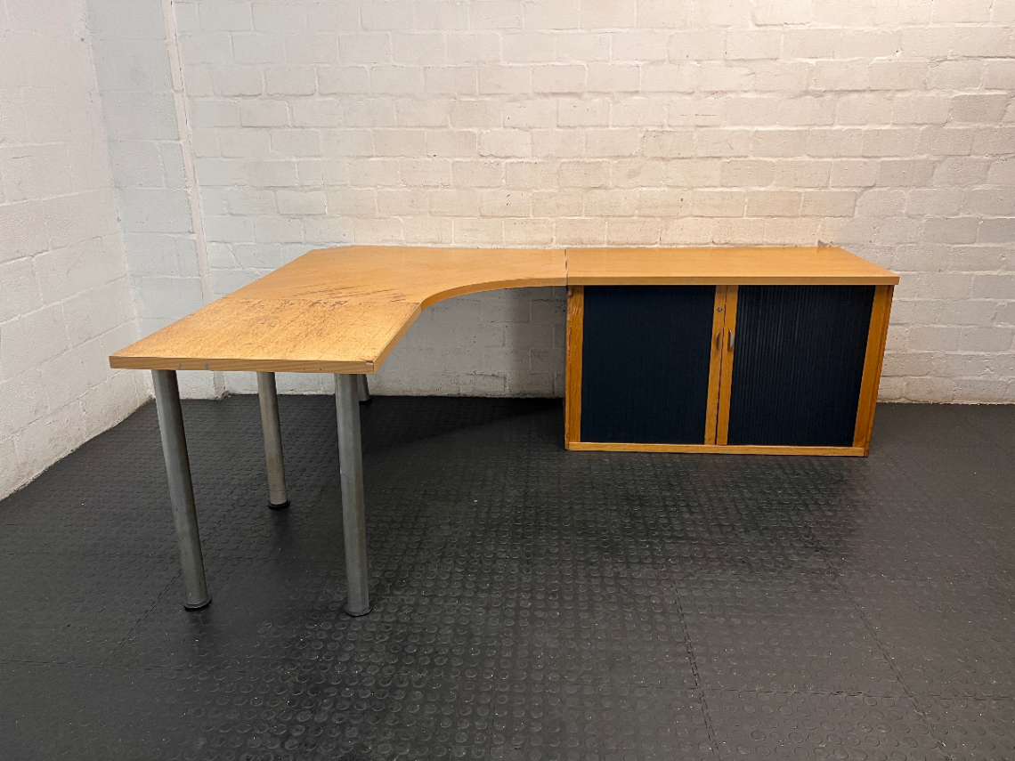 Light Oak L-Shaped Office Desk with Roller Shutter Credenza — Good Working Order with Water Damage on Surface - 2ndhandwarehouse.com